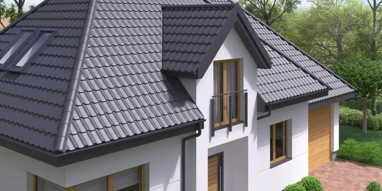 Nowoczesny dom z szarymi dach&oacute;wkami. Eleganckie kolory dach&oacute;w podkreślają architekturę.
